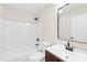 Modern bathroom features a combination tub/shower with white subway tile surround and stylish vanity at 120 Roger Dr, Statesville, NC 28625