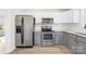 Well-equipped kitchen with stainless steel appliances, ample counter space, and modern design at 120 Roger Dr, Statesville, NC 28625