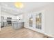 Modern eat-in kitchen with stainless steel appliances, granite countertops, and ample cabinet space at 120 Roger Dr, Statesville, NC 28625