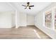 Spacious living room with wood floors, bright windows, and ample space for furniture at 120 Roger Dr, Statesville, NC 28625