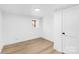 Bright, airy bedroom with natural light, complemented by modern flooring and a fresh, clean aesthetic at 1324 Southampton St, Shelby, NC 28152