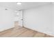 Spacious bedroom features modern flooring and fresh paint, creating a serene and inviting living space at 1324 Southampton St, Shelby, NC 28152
