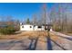 Well-kept single-story home featuring a covered carport, set on a clear lot at 1324 Southampton St, Shelby, NC 28152