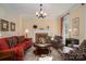 Inviting living room with a brick fireplace, elegant decor, and a plush rug adding warmth and character at 1336 College Ave, Shelby, NC 28152