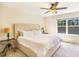 Inviting bedroom with a plush bed, soft neutral tones, and natural light at 13529 Browhill Ln, Charlotte, NC 28278