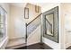 Staircase with carpet steps and dark hardwood floors leading to the upper level at 13529 Browhill Ln, Charlotte, NC 28278