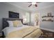 Cozy bedroom featuring a comfortable bed, soft lighting, and charming decor accents at 13822 Tributary Ct, Davidson, NC 28036
