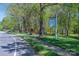 Rocky River Greenway features accessible walking paths, park benches, and lush greenery providing walking and biking at 13822 Tributary Ct, Davidson, NC 28036