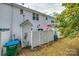 Backyard area with a privacy fence and lawn; perfect for outdoor activities at 140 Reid Ln, Pineville, NC 28134