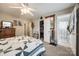 Inviting bedroom with quilt, ceiling fan, closet, and ensuite bathroom at 140 Reid Ln, Pineville, NC 28134