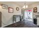 Bright dining area with sliding doors to the patio, featuring a modern table and a cozy ambiance at 140 Reid Ln, Pineville, NC 28134