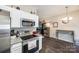 Well-equipped kitchen featuring stainless steel appliances and sleek countertops at 140 Reid Ln, Pineville, NC 28134