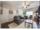 Spacious living room with an inviting atmosphere, hardwood floors, comfortable furniture, and ample natural light at 140 Reid Ln, Pineville, NC 28134