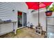 Enclosed patio with sliding glass doors, convenient for indoor-outdoor living and entertaining at 140 Reid Ln, Pineville, NC 28134