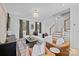 Spacious living room with cozy seating, a staircase, and modern accents at 14012 Felix Ln # 7, Charlotte, NC 28277
