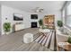 This virtually staged living room boasts bright, neutral colors and a cozy fireplace, great for entertaining at 14106 Ridgewater Way, Charlotte, NC 28278