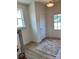Bright foyer with wood-look floors and neutral paint at 15340 Ballancroft Pkwy # 15, Charlotte, NC 28277