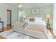 Spacious and well-lit bedroom with stylish decor and a plush rug at 2028 Scott Ave, Charlotte, NC 28203
