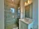 Modern bathroom with tiled walk-in shower and sleek vanity at 2035 Clarksdale Dr # 33, Charlotte, NC 28206
