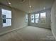 Bedroom featuring multiple windows providing natural light at 2035 Clarksdale Dr # 33, Charlotte, NC 28206