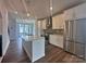 Modern kitchen features stainless steel appliances, a center island, and ample counter space at 2035 Clarksdale Dr # 33, Charlotte, NC 28206