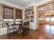 Charming breakfast nook with a built-in bench, and hardwood floors at 2112 Floral Ave, Charlotte, NC 28203