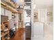 Spacious walk-in closet connected to bathroom featuring custom shelving and ample storage at 2112 Floral Ave, Charlotte, NC 28203