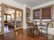 Cozy dining area with built-in bookshelves and window seat, perfect for relaxing meals at 2112 Floral Ave, Charlotte, NC 28203