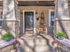Inviting front entrance with decorative planters and accent lighting at 2112 Floral Ave, Charlotte, NC 28203