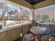 Cozy front porch with stone pillar accents and outdoor seating area at 2112 Floral Ave, Charlotte, NC 28203