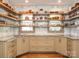 Stylish kitchen with granite countertops, open shelving and lots of natural light at 2112 Floral Ave, Charlotte, NC 28203