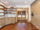 Well lit kitchen showcasing built-in appliances and hardwood floors at 2112 Floral Ave, Charlotte, NC 28203