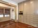 Pantry view featuring built-in cabinets and stainless steel appliances at 2112 Floral Ave, Charlotte, NC 28203