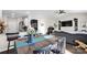 Open living room with view of the modern kitchen at 2324 Lanza Dr, Charlotte, NC 28215