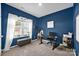 A sunlit office features desk, chair, stylish decor, and an inspirational 'You're on Mute' sign at 2324 Lanza Dr, Charlotte, NC 28215