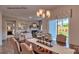 Elegant dining room offering a view of the backyard and seamlessly connects to the living area at 233 Giant Oak Ave, Statesville, NC 28677
