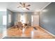 Cozy dining area with hardwood floors, neutral paint, and natural light at 2864 Sweeping Pine Ln, Denver, NC 28037