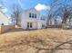 The back of the home has a fenced yard, air conditioning units, and plenty of space at 3215 Isenhour St, Charlotte, NC 28206