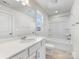 Bright bathroom featuring modern fixtures, including a shower-tub combo at 3215 Isenhour St, Charlotte, NC 28206