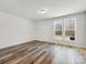 Bedroom with wood flooring and natural light at 3215 Isenhour St, Charlotte, NC 28206