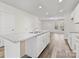 Spacious kitchen with white cabinets and stainless steel sink at 3215 Isenhour St, Charlotte, NC 28206