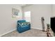 Small bedroom featuring a blue loveseat, an art print, a small window, and carpeted floors at 3532 Tully Ave, Kannapolis, NC 28081