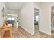 Spacious hallway with wood floors leads to bright living spaces at 3532 Tully Ave, Kannapolis, NC 28081