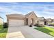 Well-maintained single-Gathering home featuring a brick facade, attached garage, and inviting curb appeal at 3532 Tully Ave, Kannapolis, NC 28081