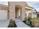 Covered front entryway with brick archway and decorative landscaping detail at 3532 Tully Ave, Kannapolis, NC 28081