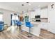 Bright kitchen with a center island, pendant lights, stainless appliances, and an adjacent dining area at 3532 Tully Ave, Kannapolis, NC 28081