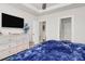 Bright primary bedroom with a ceiling fan and dresser offer a relaxing atmosphere at 3532 Tully Ave, Kannapolis, NC 28081