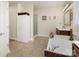 Bright bathroom with a soaking tub, walk-in shower, vanity, and plenty of storage space at 4321 Rolling Acres Rd, Charlotte, NC 28213