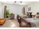 Comfortable bedroom featuring two beds, natural light, neutral tones, and a cozy atmosphere at 4321 Rolling Acres Rd, Charlotte, NC 28213