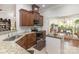 Well-appointed kitchen featuring granite countertops, stainless steel appliances, and a convenient center island with seating at 4321 Rolling Acres Rd, Charlotte, NC 28213